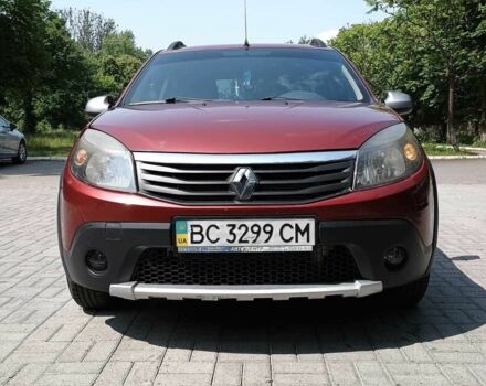 Красный Рено Сандеро, объемом двигателя 1.6 л и пробегом 166 тыс. км за 5990 $, фото 1 на Automoto.ua