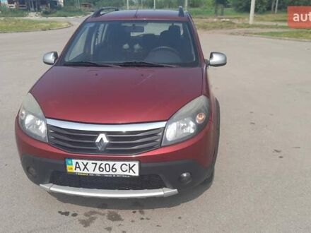 Красный Рено Сандеро, объемом двигателя 1.6 л и пробегом 185 тыс. км за 6200 $, фото 1 на Automoto.ua