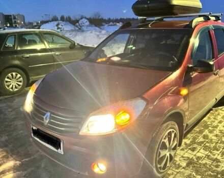 Красный Рено Сандеро, объемом двигателя 1.4 л и пробегом 103 тыс. км за 6000 $, фото 1 на Automoto.ua