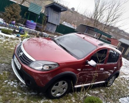 Красный Рено Сандеро, объемом двигателя 1.6 л и пробегом 109 тыс. км за 7900 $, фото 1 на Automoto.ua