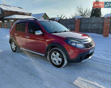 Червоний Рено Сандеро, об'ємом двигуна 1.6 л та пробігом 101 тис. км за 6700 $, фото 1 на Automoto.ua