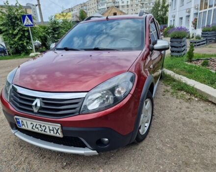 Червоний Рено Сандеро, об'ємом двигуна 1.6 л та пробігом 154 тис. км за 7000 $, фото 1 на Automoto.ua
