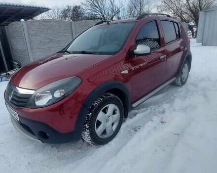 Червоний Рено Сандеро, об'ємом двигуна 1.6 л та пробігом 113 тис. км за 6500 $, фото 1 на Automoto.ua