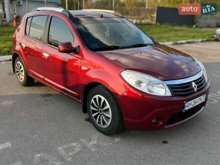 Красный Рено Сандеро, объемом двигателя 1.6 л и пробегом 160 тыс. км за 5900 $, фото 1 на Automoto.ua