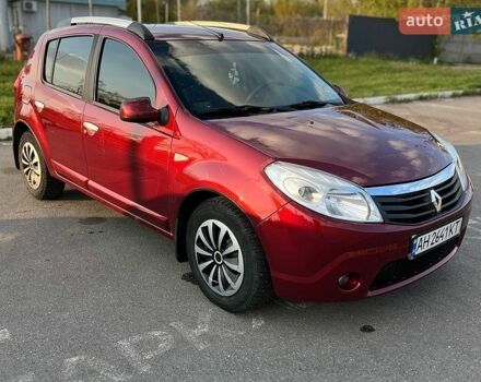 Красный Рено Сандеро, объемом двигателя 1.6 л и пробегом 160 тыс. км за 5900 $, фото 1 на Automoto.ua