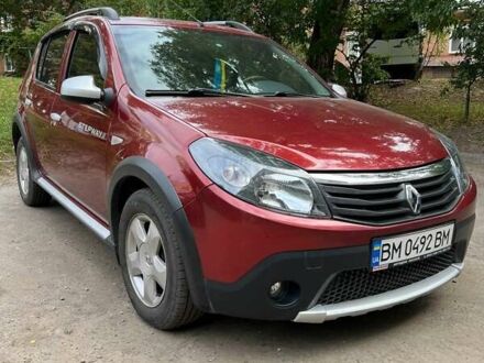 Красный Рено Сандеро, объемом двигателя 1.6 л и пробегом 96 тыс. км за 6500 $, фото 1 на Automoto.ua