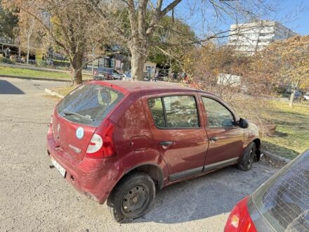 Красный Рено Сандеро, объемом двигателя 1.4 л и пробегом 150 тыс. км за 1500 $, фото 1 на Automoto.ua