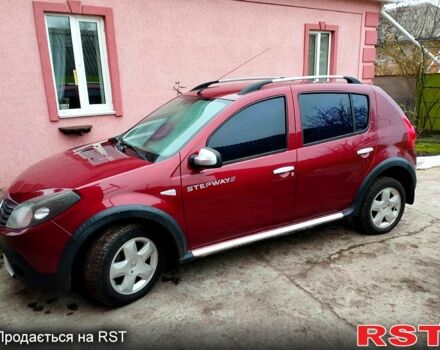 Червоний Рено Сандеро, об'ємом двигуна 1.6 л та пробігом 167 тис. км за 5950 $, фото 1 на Automoto.ua