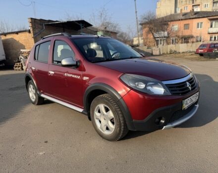 Красный Рено Сандеро, объемом двигателя 1.6 л и пробегом 76 тыс. км за 7000 $, фото 1 на Automoto.ua
