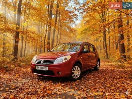 Червоний Рено Сандеро, об'ємом двигуна 1.39 л та пробігом 111 тис. км за 6200 $, фото 1 на Automoto.ua