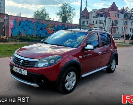 Красный Рено Сандеро, объемом двигателя 1.6 л и пробегом 104 тыс. км за 6850 $, фото 1 на Automoto.ua
