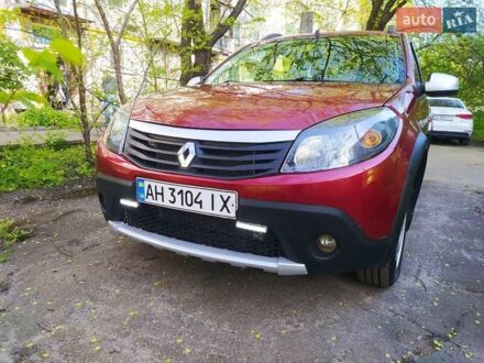 Рено Сандеро 2012 в Киеве на Automoto.ua Красный Рено Сандеро, объемом двигателя 1.6 л и пробегом 117 тыс. км за 6500 $, фото 1 на Automoto.ua
