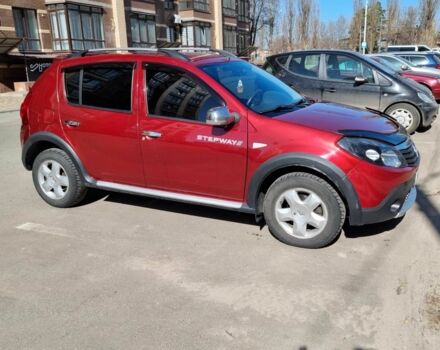 Красный Рено Сандеро, объемом двигателя 1.6 л и пробегом 110 тыс. км за 7390 $, фото 1 на Automoto.ua