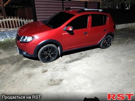 Рено Сандеро 2013 у Валках на Automoto.ua Червоний Рено Сандеро, об'ємом двигуна 1.5 л та пробігом 143 тис. км за 8100 $, фото 1 на Automoto.ua
