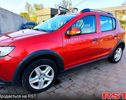 Красный Рено Сандеро, объемом двигателя 1.5 л и пробегом 193 тыс. км за 7000 $, фото 1 на Automoto.ua