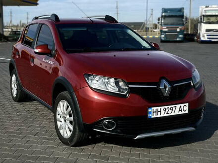 Красный Рено Сандеро, объемом двигателя 1.6 л и пробегом 87 тыс. км за 9900 $, фото 1 на Automoto.ua