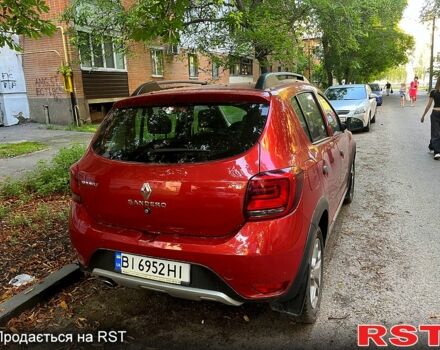 Красный Рено Сандеро, объемом двигателя 1.5 л и пробегом 120 тыс. км за 9300 $, фото 1 на Automoto.ua