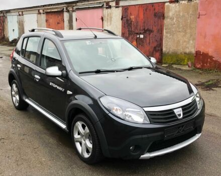 Серый Рено Сандеро, объемом двигателя 1.6 л и пробегом 125 тыс. км за 5500 $, фото 1 на Automoto.ua