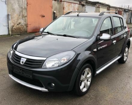 Серый Рено Сандеро, объемом двигателя 1.6 л и пробегом 125 тыс. км за 5500 $, фото 7 на Automoto.ua