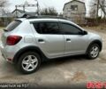 Серый Рено Сандеро, объемом двигателя 1.5 л и пробегом 128 тыс. км за 10500 $, фото 1 на Automoto.ua
