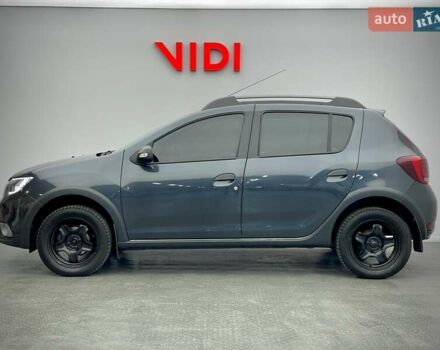 Серый Рено Сандеро, объемом двигателя 1 л и пробегом 58 тыс. км за 10884 $, фото 2 на Automoto.ua