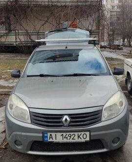 Серый Рено Сандеро, объемом двигателя 1.6 л и пробегом 254 тыс. км за 3700 $, фото 1 на Automoto.ua