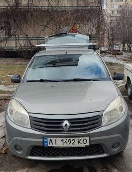 Серый Рено Сандеро, объемом двигателя 1.6 л и пробегом 254 тыс. км за 3700 $, фото 1 на Automoto.ua