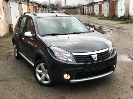 Серый Рено Сандеро, объемом двигателя 1.6 л и пробегом 125 тыс. км за 5500 $, фото 1 на Automoto.ua