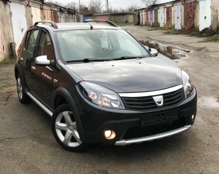 Серый Рено Сандеро, объемом двигателя 1.6 л и пробегом 125 тыс. км за 5500 $, фото 1 на Automoto.ua