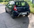 Синий Рено Сандеро, объемом двигателя 1.39 л и пробегом 279 тыс. км за 3550 $, фото 2 на Automoto.ua