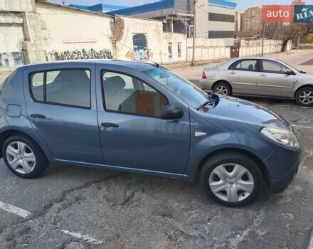 Синий Рено Сандеро, объемом двигателя 1.39 л и пробегом 261 тыс. км за 5200 $, фото 2 на Automoto.ua