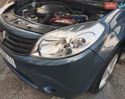 Синий Рено Сандеро, объемом двигателя 1.39 л и пробегом 261 тыс. км за 5200 $, фото 19 на Automoto.ua