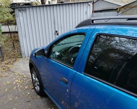 Синий Рено Сандеро, объемом двигателя 0.9 л и пробегом 100 тыс. км за 8700 $, фото 6 на Automoto.ua