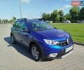 Синий Рено Сандеро, объемом двигателя 0.9 л и пробегом 88 тыс. км за 8999 $, фото 1 на Automoto.ua