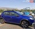 Синій Рено Сандеро, об'ємом двигуна 0.9 л та пробігом 58 тис. км за 11700 $, фото 1 на Automoto.ua