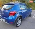 Синий Рено Сандеро, объемом двигателя 0.9 л и пробегом 97 тыс. км за 11500 $, фото 3 на Automoto.ua