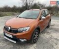 Оранжевый Рено Сандеро, объемом двигателя 1.46 л и пробегом 84 тыс. км за 11500 $, фото 2 на Automoto.ua