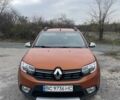 Оранжевый Рено Сандеро, объемом двигателя 1.5 л и пробегом 84 тыс. км за 11500 $, фото 1 на Automoto.ua