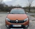 Оранжевый Рено Сандеро, объемом двигателя 1.5 л и пробегом 84 тыс. км за 11500 $, фото 1 на Automoto.ua