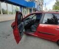 Рено Сценік II 2005 у Києві на Automoto.ua Червоний Рено Сценік II, об'ємом двигуна 2 л та пробігом 280 тис. км за 3500 $, фото 12 на Automoto.ua