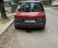 Красный Рено Сценик II, объемом двигателя 1.6 л и пробегом 250 тыс. км за 4100 $, фото 1 на Automoto.ua