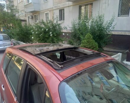 Красный Рено Сценик II, объемом двигателя 1.9 л и пробегом 230 тыс. км за 5200 $, фото 3 на Automoto.ua