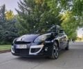 Черный Рено Сценик III, объемом двигателя 1.6 л и пробегом 303 тыс. км за 6699 $, фото 1 на Automoto.ua