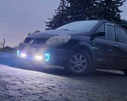 Черный Рено Сценик, объемом двигателя 1.6 л и пробегом 250 тыс. км за 3900 $, фото 1 на Automoto.ua