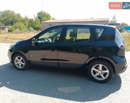 Черный Рено Сценик, объемом двигателя 1.5 л и пробегом 210 тыс. км за 7550 $, фото 1 на Automoto.ua