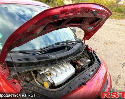 Рено Сценик 2003 в Жмеренке на Automoto.ua Красный Рено Сценик, объемом двигателя 1.6 л и пробегом 200 тыс. км за 3500 $, фото 11 на Automoto.ua