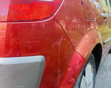 Красный Рено Сценик, объемом двигателя 1.6 л и пробегом 231 тыс. км за 3700 $, фото 3 на Automoto.ua