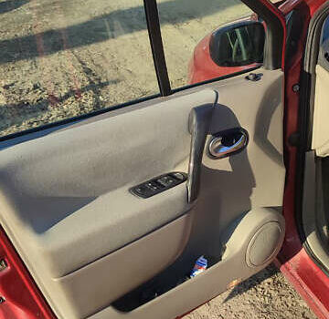 Красный Рено Сценик, объемом двигателя 1.6 л и пробегом 207 тыс. км за 3999 $, фото 3 на Automoto.ua