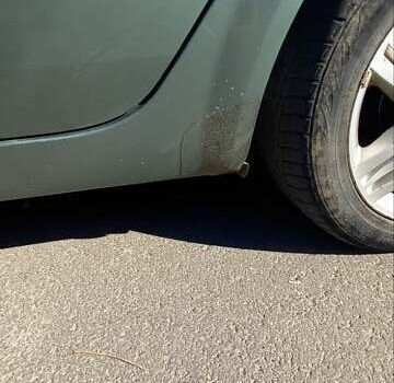 Зеленый Рено Сценик, объемом двигателя 2 л и пробегом 213 тыс. км за 4900 $, фото 2 на Automoto.ua