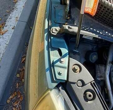 Зеленый Рено Сценик, объемом двигателя 2 л и пробегом 213 тыс. км за 4900 $, фото 3 на Automoto.ua